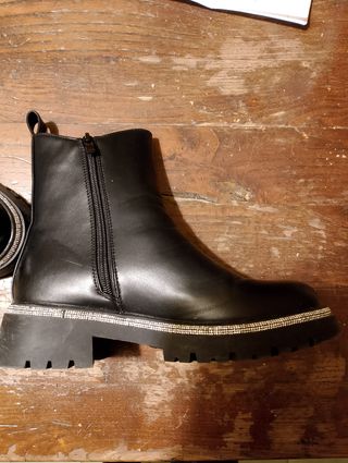 Stivali neri lucidi con inserti argento