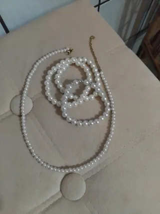 Set bigiotteria perle bianche e oro