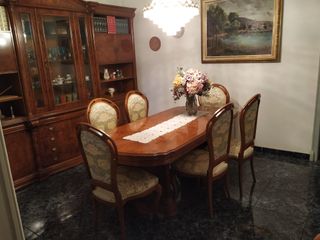 Silla de madera maciza tapizada