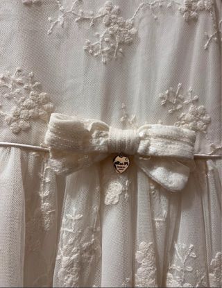 Vestito bianco bambina pizzo fiocco