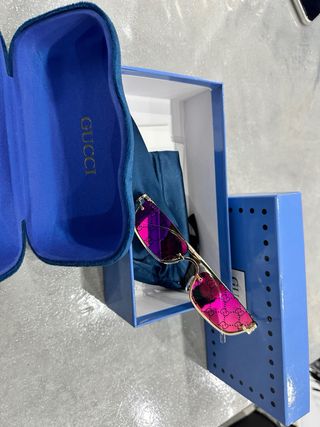 Occhiali da sole Gucci oro e rosa