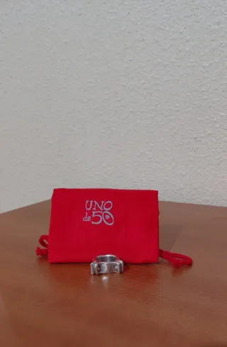 Anillo Uno de 50 de plata.