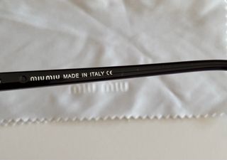 Óculos de Sol Miu Miu Pretos