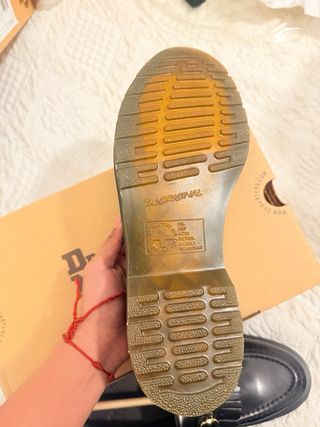 Mocassini Dr. Martens neri con frange