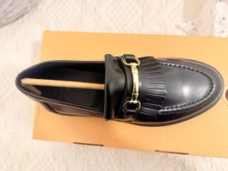 Mocassini Dr. Martens neri con frange