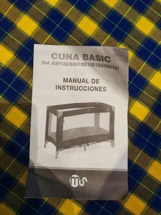 Cuna de viaje azul y amarilla ,con colchón