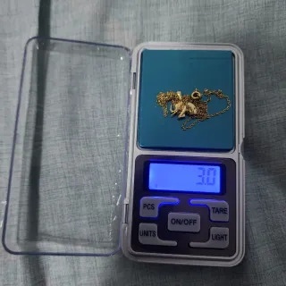 Colgante de oro 18k con elefante