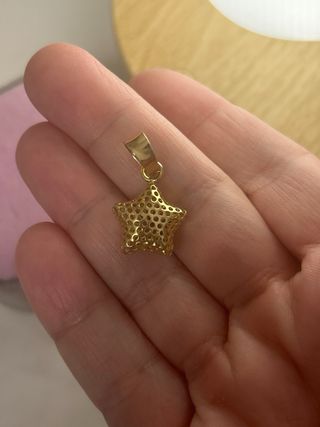 Colgante estrella oro