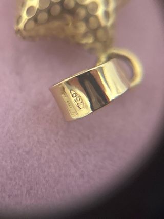 Colgante estrella oro