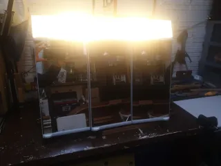 Armadio da bagno in plastica e vetro