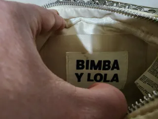 Lote de 4 bolsos beige, blanco y azul marino.