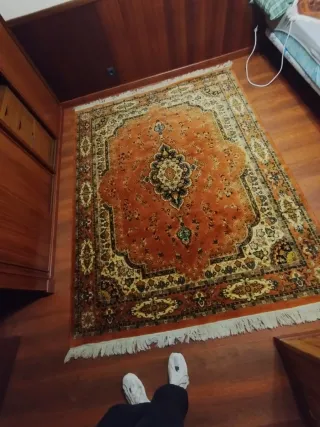 Alfombra estilo persa naranja y marrón