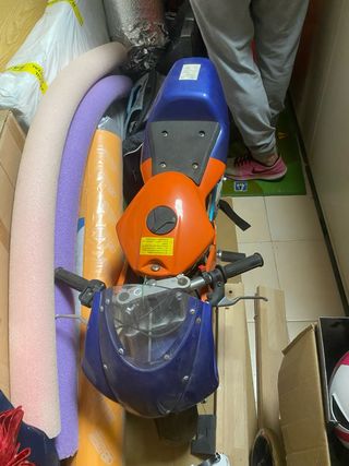 Mini moto infantil naranja y azul