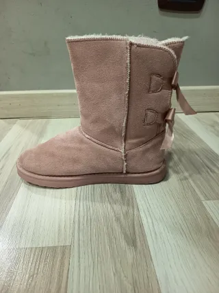 Stivaletti rosa con fiocchi simil Ugg - donna