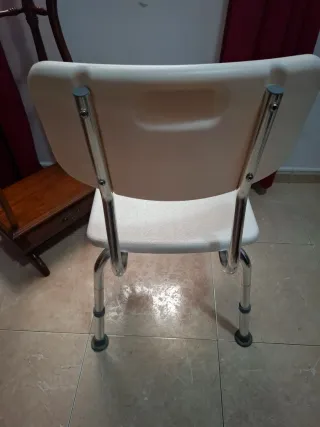 Silla de ducha con respaldo