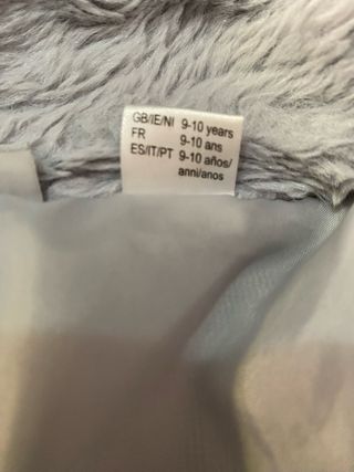 Chaqueta peluda gris 8 años aproxi.140cm