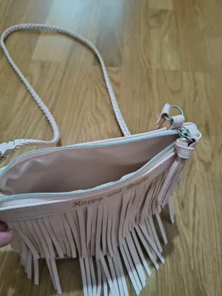 Bolso bandolera niña flecos rosa del HyM