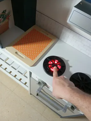 Cocina de juguete azul con accesorios