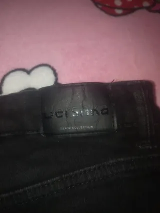 Vaqueros pitillo negros rotos