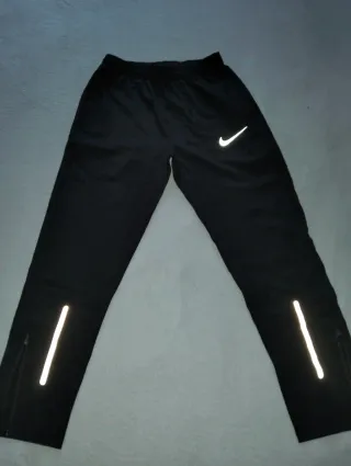 Pantalón Nike Reflectante,Talla L, perfecto estado