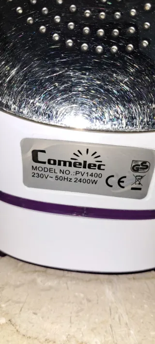 Plancha de vapor blanca y morada