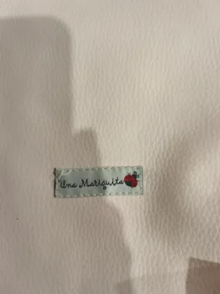 Bolso rosa bebé con mariquita