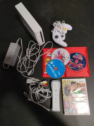 Nintendo Wii con giochi e accessori leggere