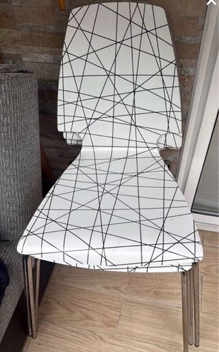 Sillas negras apilables