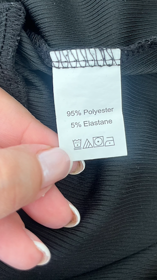 Vestido negro corto manga larga