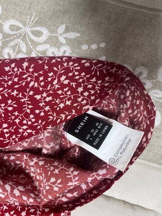 Top floral tirante con manga