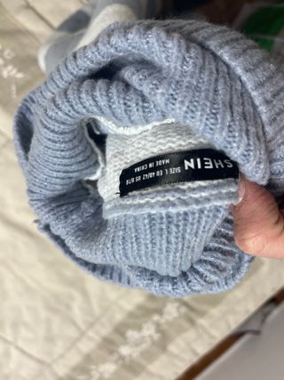 Jersey cuello alto rayas azul y blanco