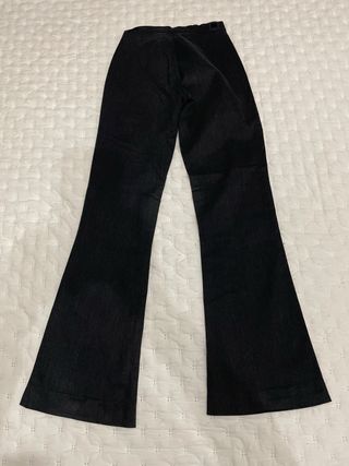 Calças de tecido pretas flare
