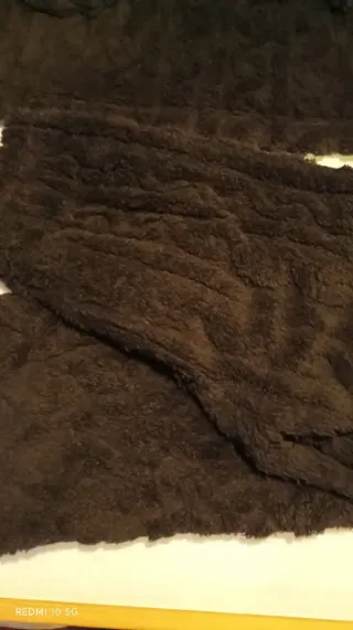 Pijama peludo preto com urso