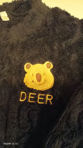 Pijama peludo preto com urso