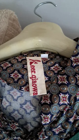 Vestido midi con chaleco incorporado