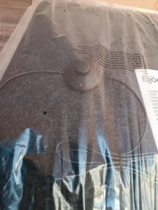 Alfombra calefactora con interruptor de pie.