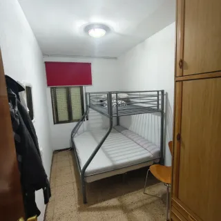 Cama litera metálica y de madera
