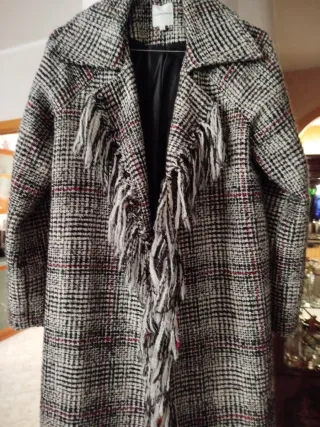 Poncho a quadri con frange