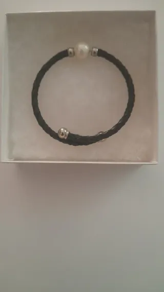 Pulsera trenzada con perla