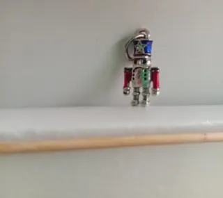 Charm Cascanueces Azul y Rojo colgante