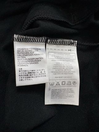 Chaqueta Adidas con capucha negra y blanca