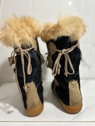 Stivali invernali con pelliccia e frange