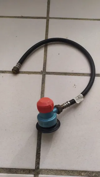 Regulador de gas con manguera
