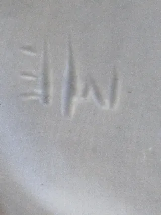 Escultura mujer con galgo de porcelana.