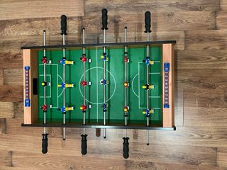 Futbolín de mesa.