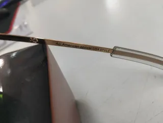 Gafas de sol American Optical doradas