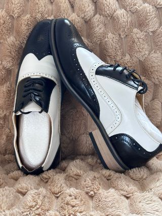 Zapatos estilo golf bicolor blanco y negro