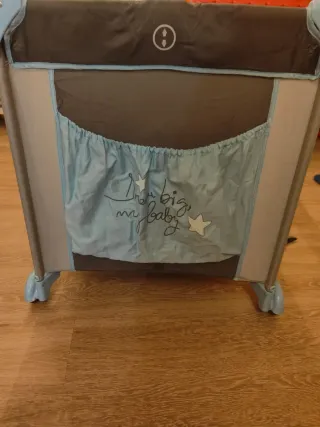 Cuna de viaje con diseño de elefantes