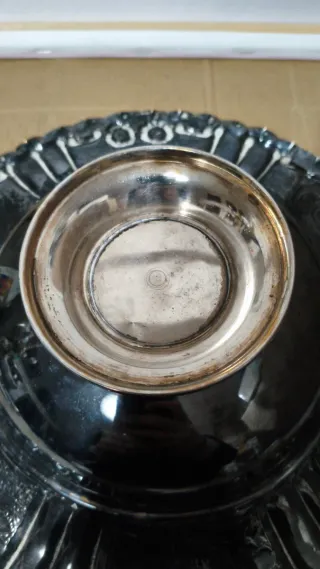 Centrotavola in metallo argentato decorato