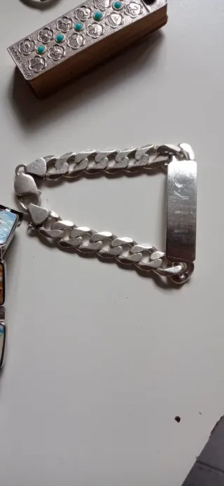 Pulsera de plata con dijes